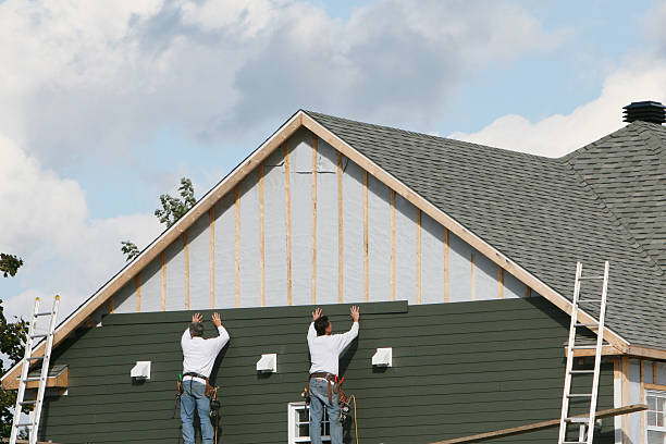 Professional Siding Contractor technician working in Sandy Hook, VA